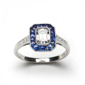 0.69ct Emerald Cut Diamond and Sapphire Cluster Ring in Platinum